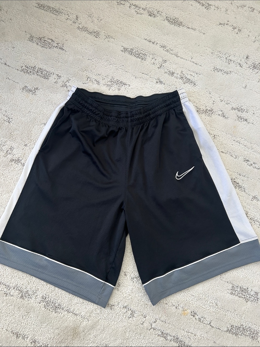 Nike Men’s Black Athletic Shorts with White Side Panels and Gray Hem